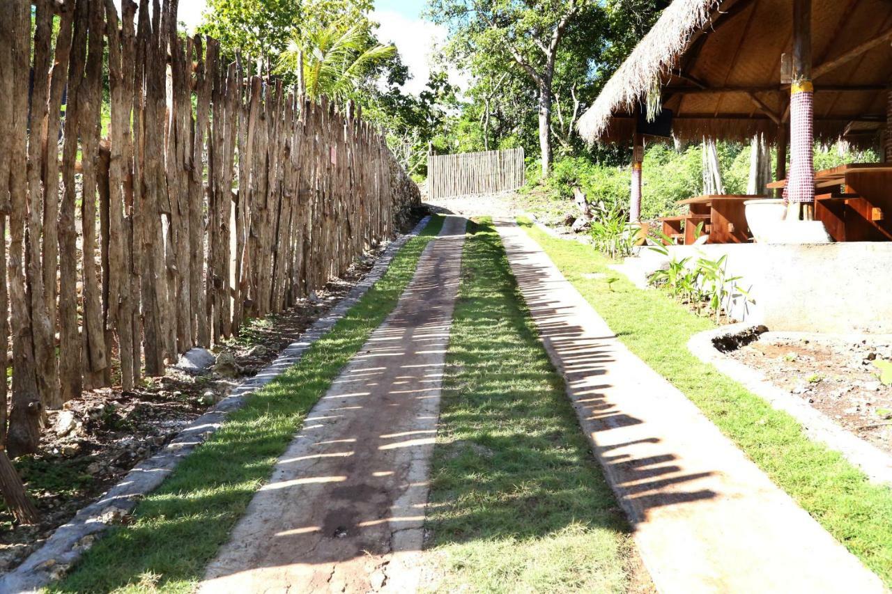 Отель Lumbung Wisesa Uluwatu Экстерьер фото